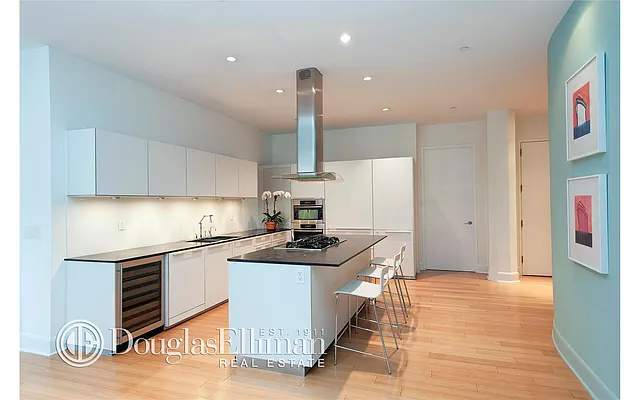 Sold by Douglas Elliman | media 18