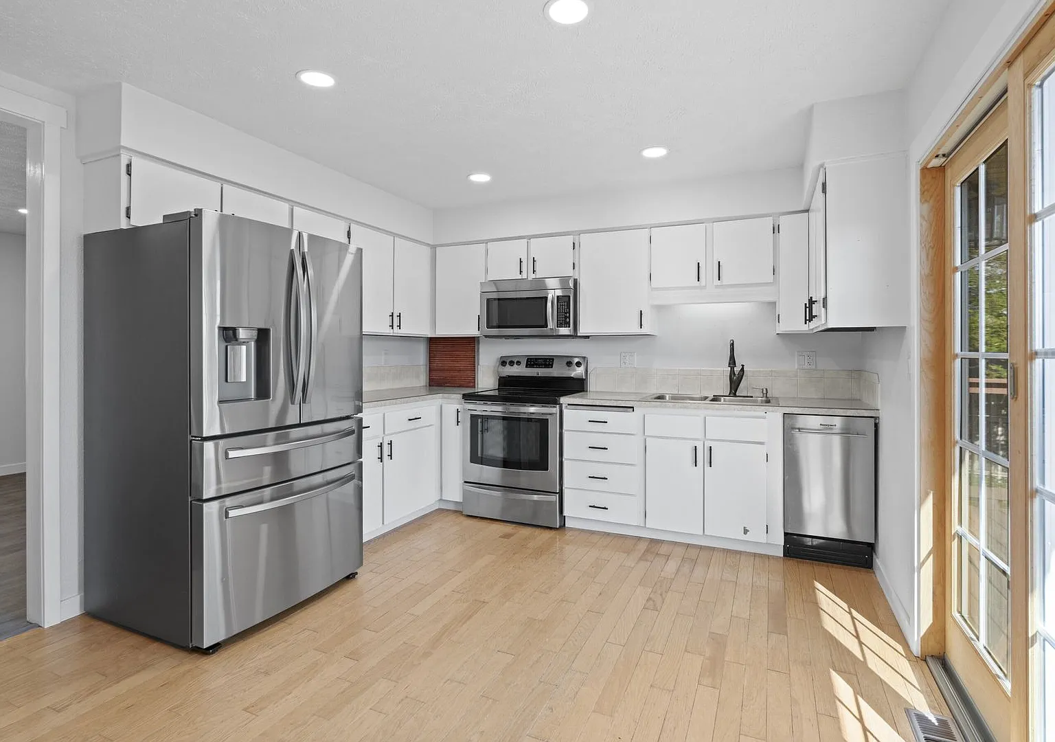 4 Bed 2 Bath Split Level home fully updated in Central Valley Greenacres neighborhood — Photo 3
