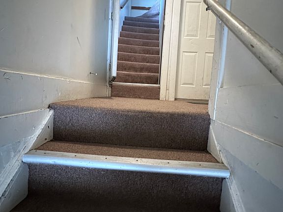There is another set of stairs once you open door.