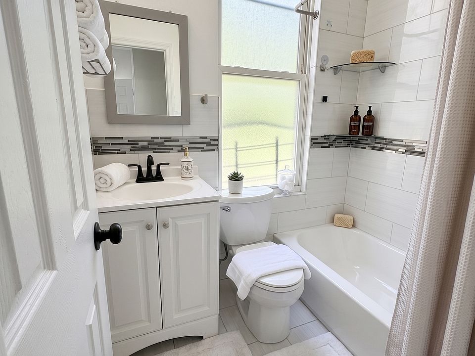 Bathroom- This room has been virtually staged using AI to help visualize its layout and design potential.