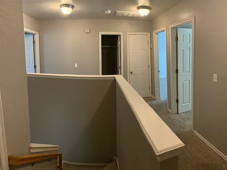 Upstairs hallway view by the laundry