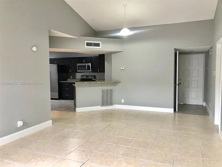 8761 Wiles Rd #306 — Photo 7