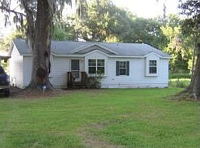Set on 5 beautiful acres in Archer, Fl