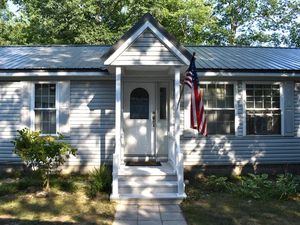 1406 Grand Blvd, Topinabee, MI 49791