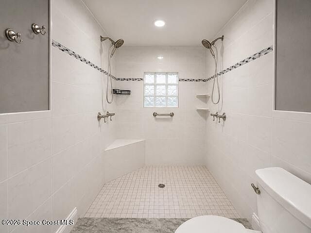 Second full bath with a tiled walk-in shower