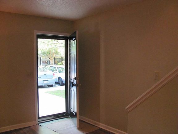 Front entrance to living room and upstairs, parking is right outside the front door two spaces