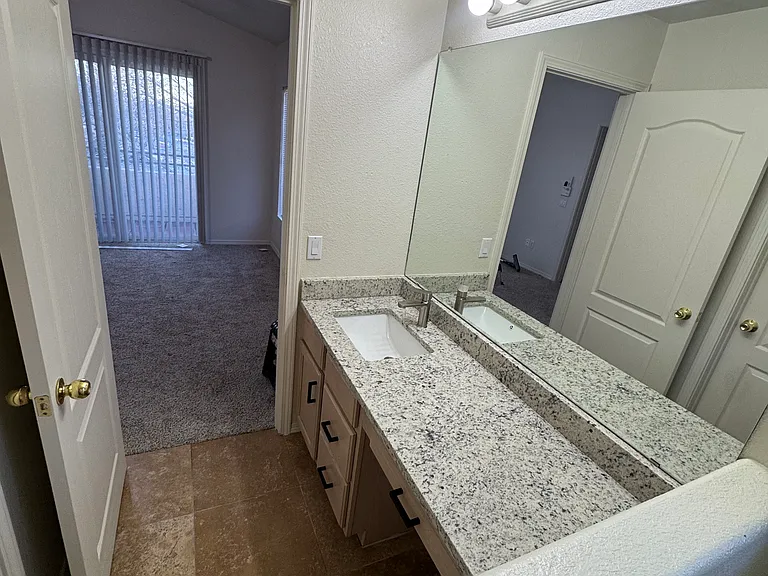 Primary bathroom with sit-down makeup vanity.