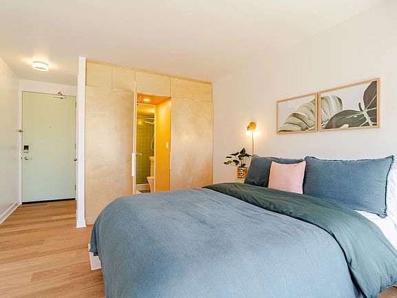 Cleverly concealed bathroom door in the wardrobe wall