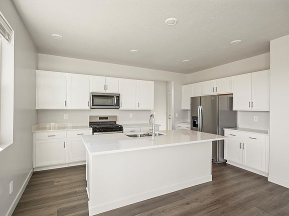 The residence 5 floorplan interior image taken at a Meritage Homes Community in West Haven, UT.
