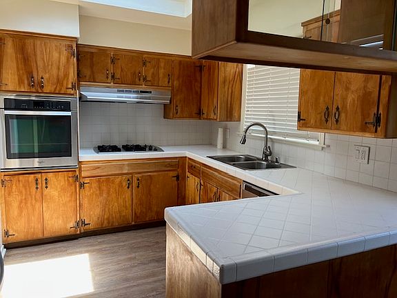 Maple cabinets and tile counters