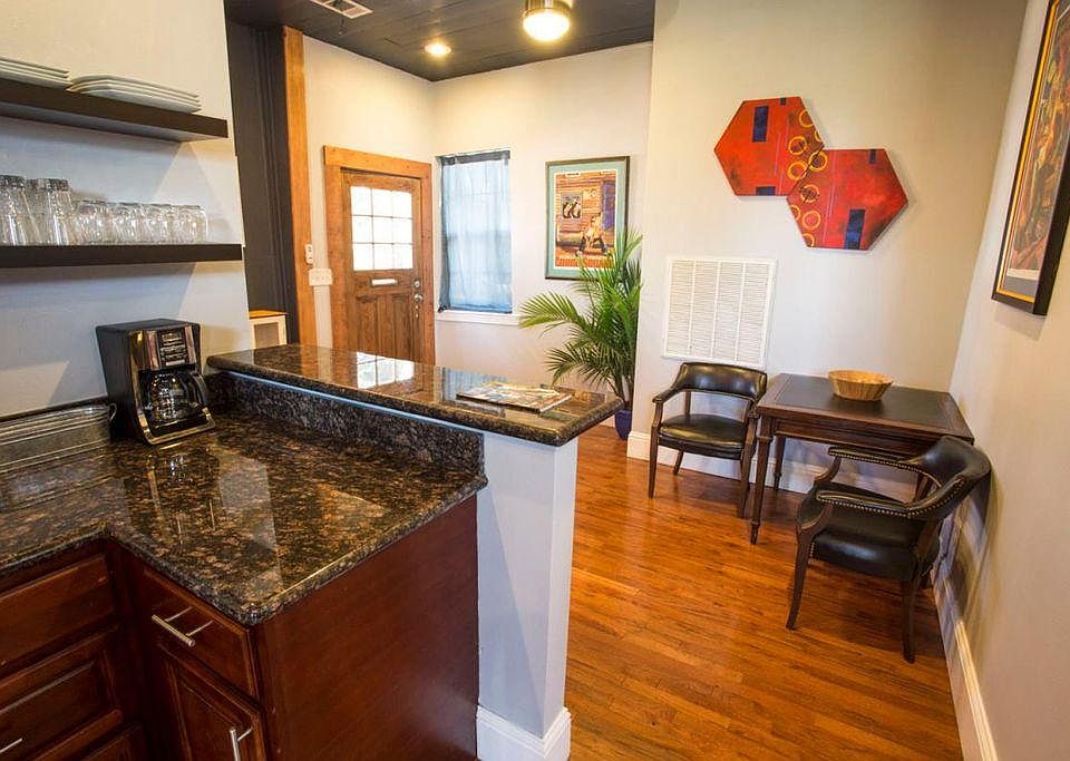 Entry door into kitchen, dining, breakfast nook