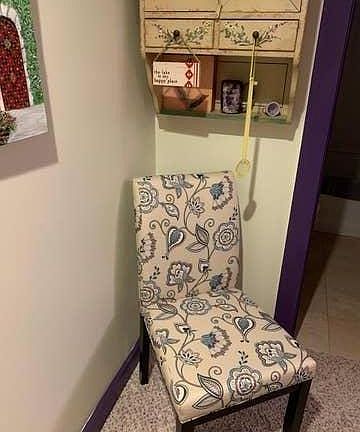 In the hallway upstairs.