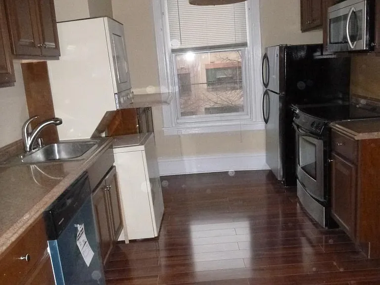Kitchen with Hardwood floor and stainless appliances