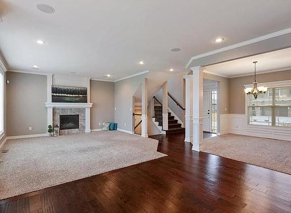 Great room and dining room and kitchen offer a wonderful open floor plan.