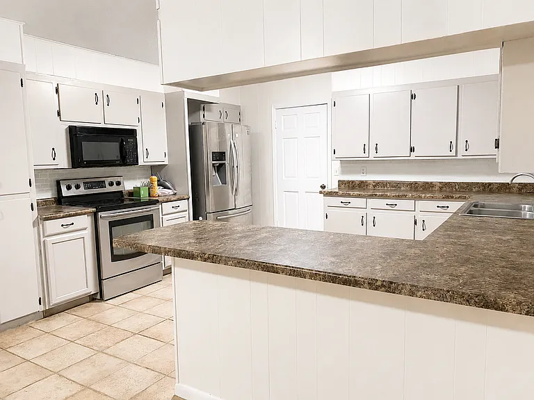 Large Kitchen with Stainless Steal Applicances