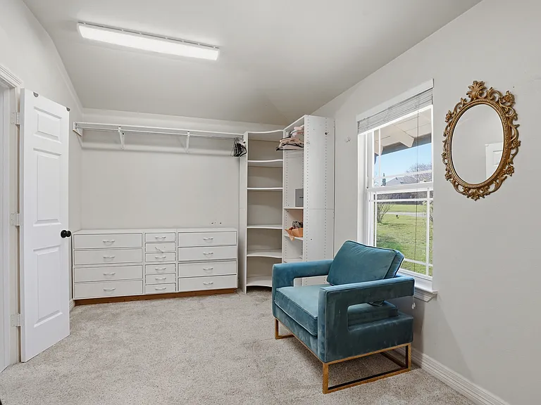 One out of 2 bedrooms converted to a walk-through closet. This is a closet galore master.