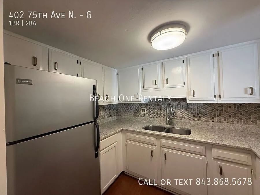 75th Ave Renovated Loft Style Townhome — Photo 4
