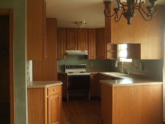 Kitchen-oak cabinets/floors
