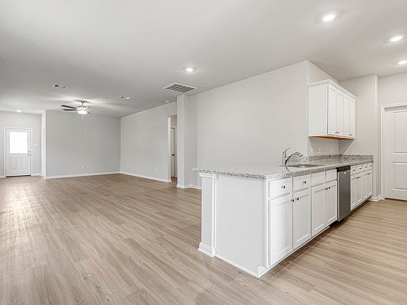 Enjoy family meals in this spacious dining room.