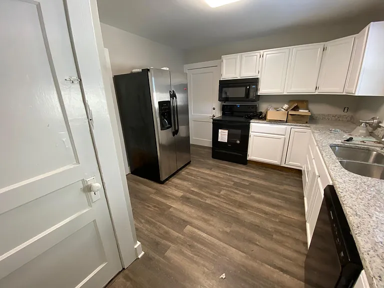 Huge remodeled kitchen with granite, all new appliances including a dishwasher and disposal. Tons of cabinet space. Lazy Susan for big items like Crockpots! Bright and airy feel. Easy care flooring.