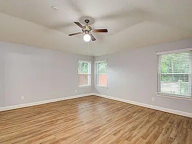 Large primary suite with generous space and plenty of natural light.