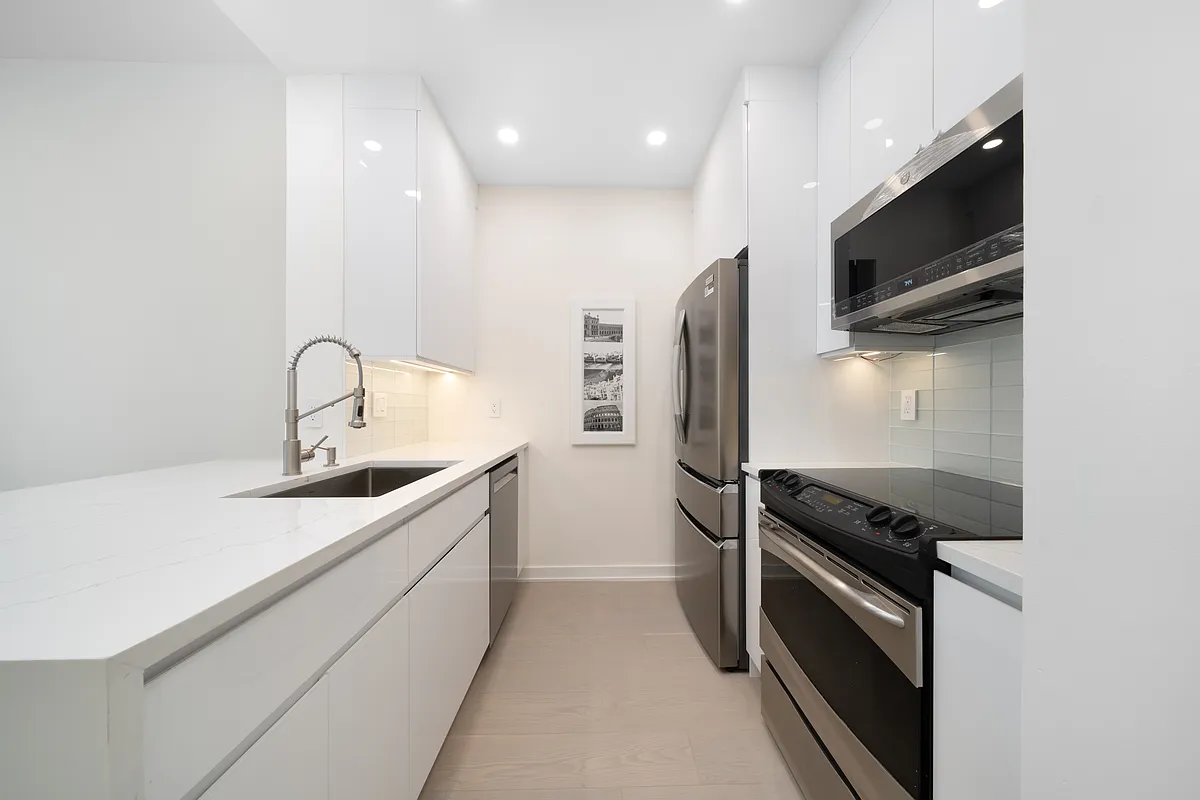 Fully updated Kitchen with Kitchenaid dishwasher, full-size Frigidaire fridge, cooktop, GE Profile microwave and under-sink water filter - convenience personified - 20 2nd St #104