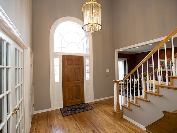 Spacious open entry with hardwoods