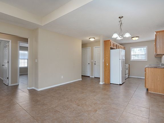 View from front door, living and kitchen
