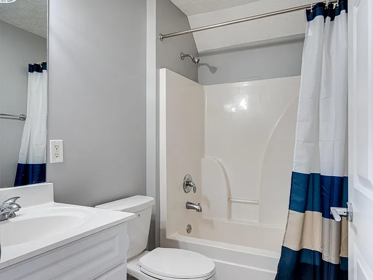 Full bath in studio apartment