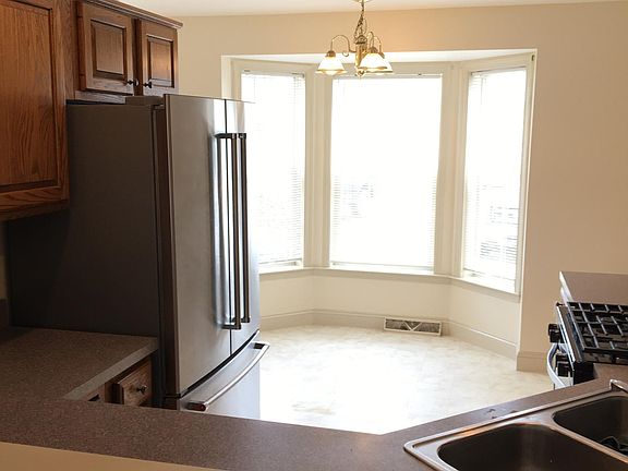 dining area in kitchen by the bay window.