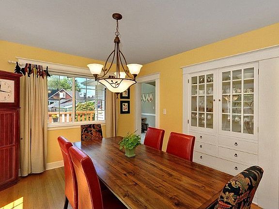 The formal dining room has an original built in china cabinet and linen drawers.
