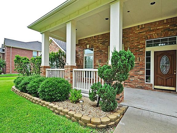 Large front porch, All 4 sides brick, Sprinkler system, Alarm system, radiant barrier, double pane w