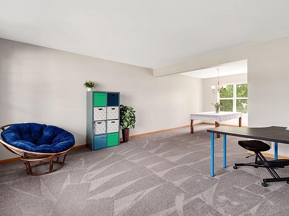 Spacious Living Room with Brand New Carpeting.