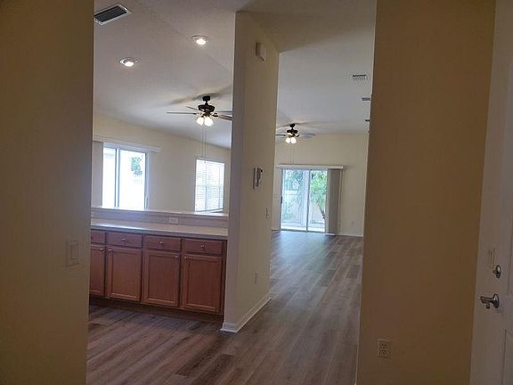 custom ceiling fans have been added to the living room as well as to every bedroom to keep the home cooler every summer