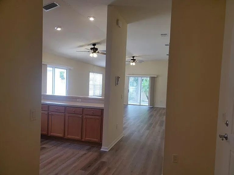 custom ceiling fans have been added to the living room as well as to every bedroom to keep the home cooler every summer