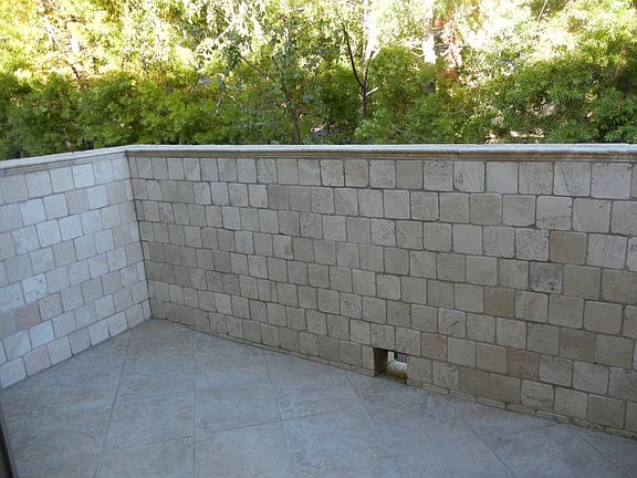 Sunny travertine balcony