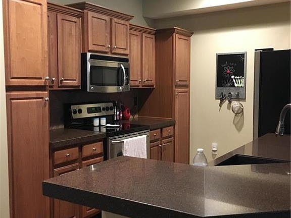 Recently renovated kitchen with hardwood floors.