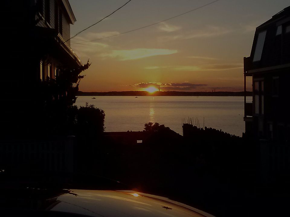 summer sunsets out windows