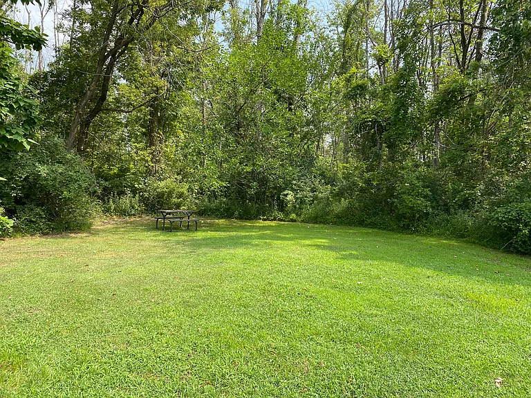 Over 3 1/2 peaceful acres. All outside maintenance included.