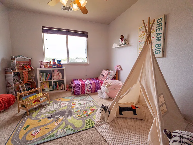 Charming & Bright Bedroom: Another generously sized bedroom filled with natural light. The open layout provides plenty of space for creative bedroom furniture, a dedicated play area, or customized storage setups.