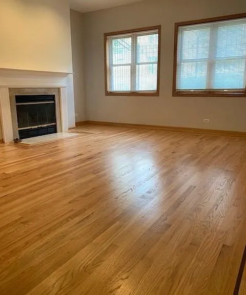 Living room with wood burning fireplace