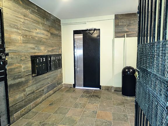 Hallway inside building mailbox very quiet building