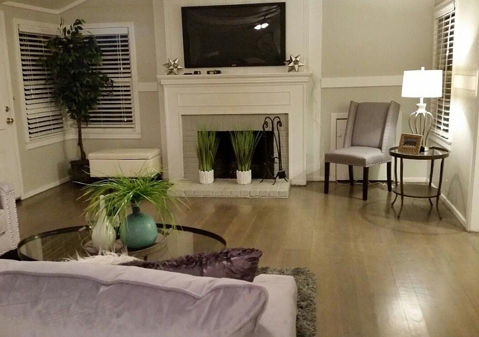 Living Room with high ceilings & fireplace
