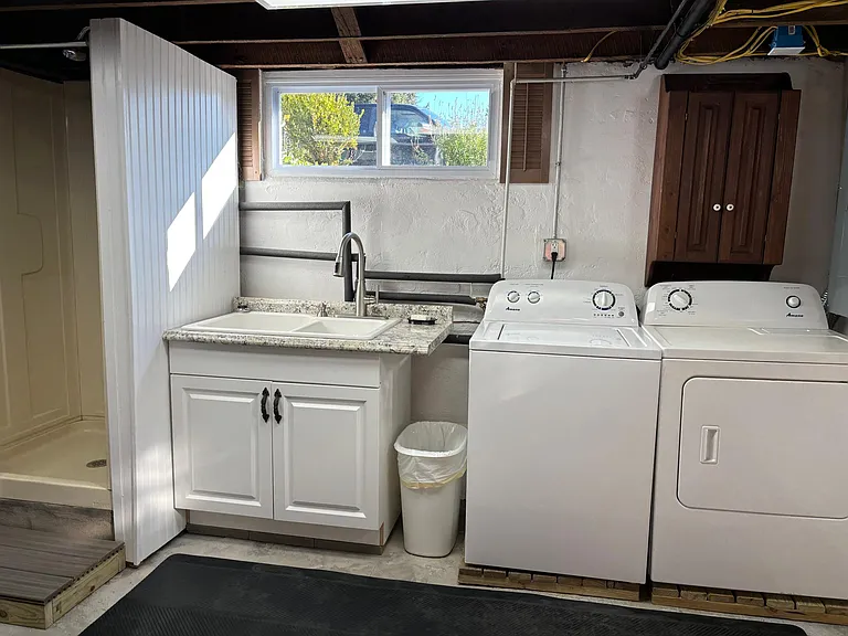 Basement - washer, dryer & shower stall