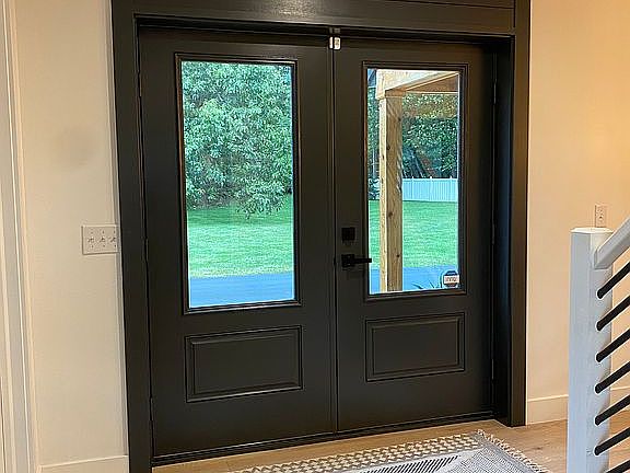 Double entry door w/shiplap.