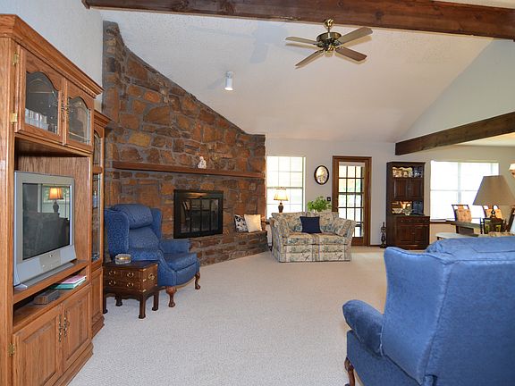 Living w/ Stone Woodburning Fireplace