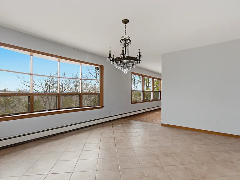Wall of windows brings the outdoors in.
