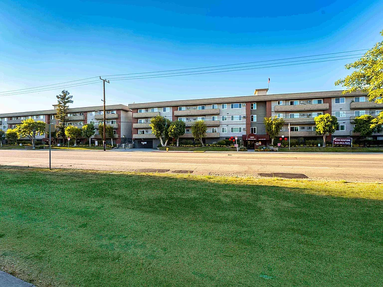 A striking exterior view of the Parkview Apartments building, highlighting the clean lines and well-maintained facade.