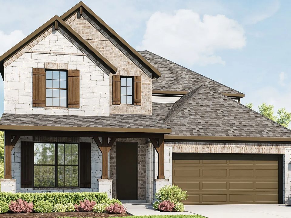 Experience luxury with distinct stone facade, wooden shutters, and manicured landscaping in Sunfield