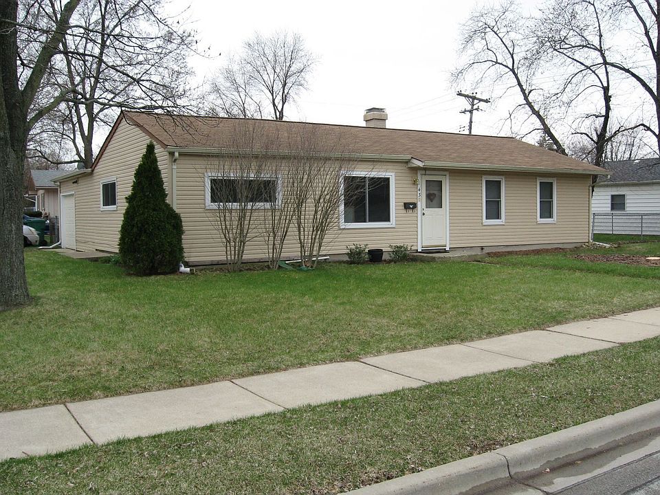 Huge corner lot with attached garage!